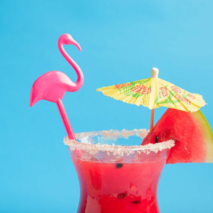watermelon-juice-on-sea-sand-with-blue-background-2026-01-09-00-21-17-utcBrollop
